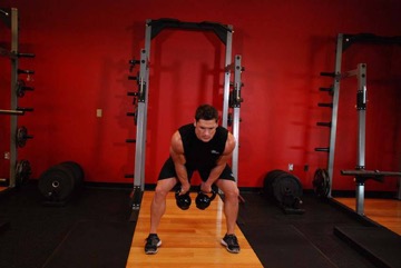 Arranque con kettlebell: posición final
