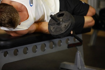Dumbbell Lying Pronation: posición final