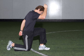 Kneeling Arm Drill: posición inicial