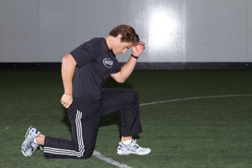 Kneeling Arm Drill: posición final