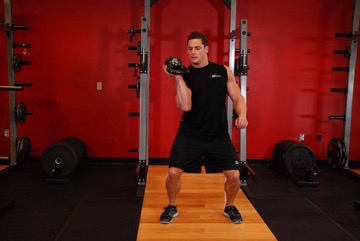 One-Arm Open Palm Kettlebell Clean: posición final