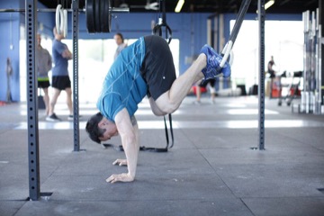Suspended Reverse Crunch: posición final